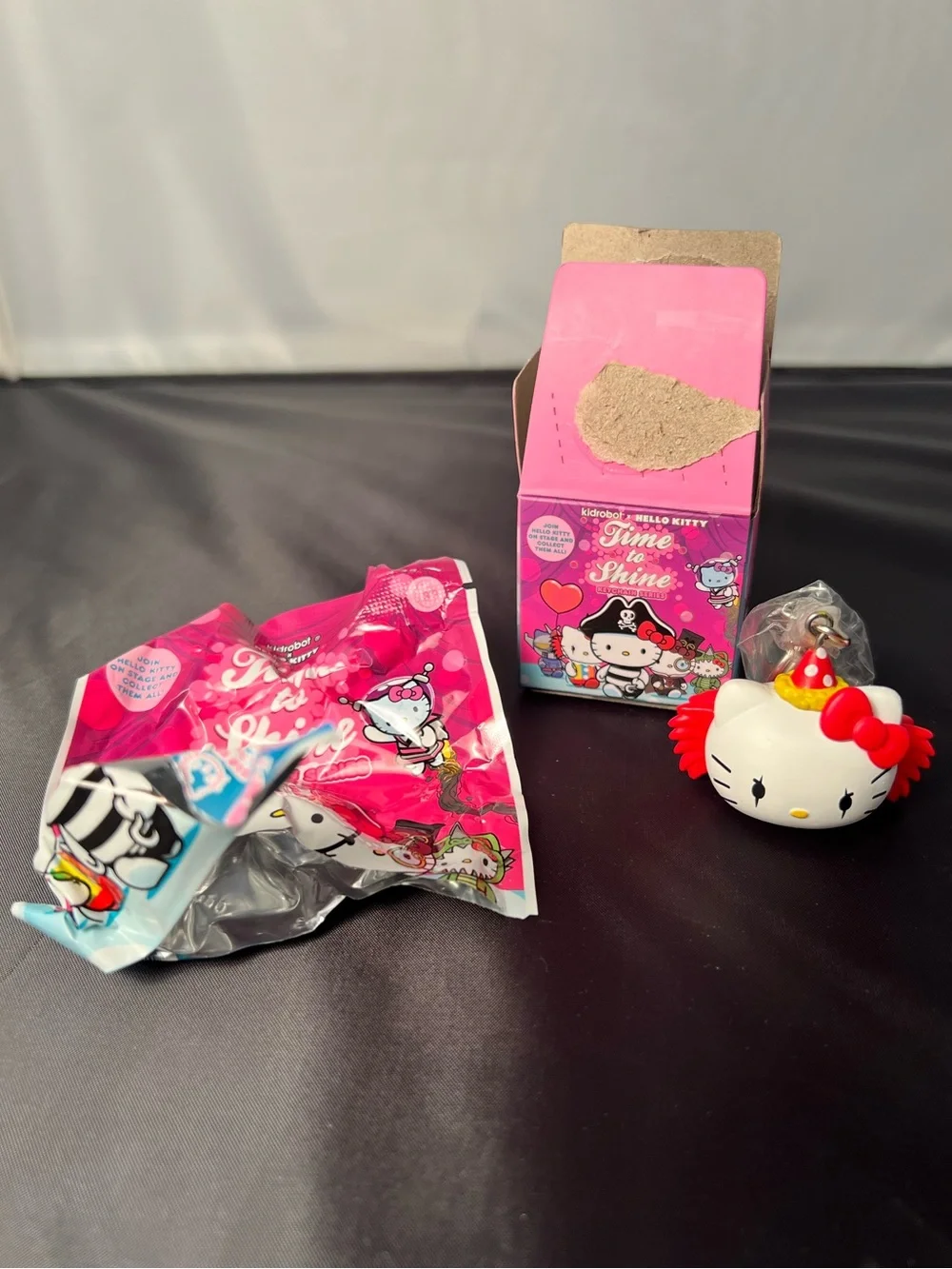 NEW Official Sanrio x Kidrobot Blind Box Hello Kitty Angry Clown Keychain 2019